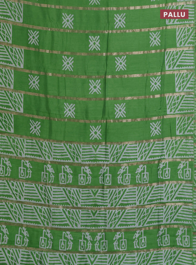 Semi chanderi saree parrot green with allover zari strips & batik butta prints in borderless style