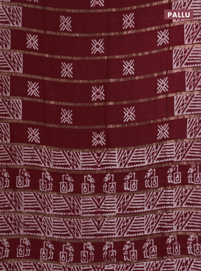 Semi chanderi saree maroon with allover zari strips & batik butta prints in borderless style