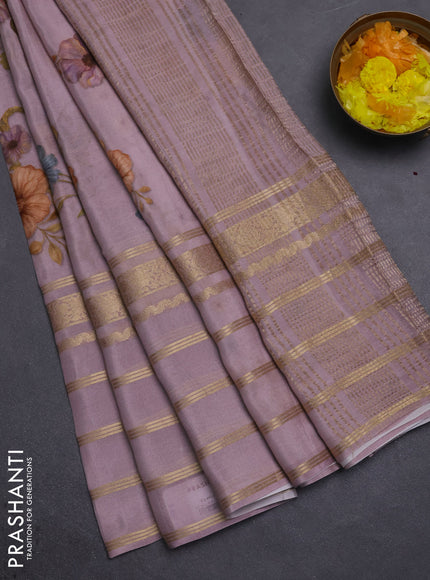 Semi georgette saree pastel pink with allover floral prints and long zari woven border