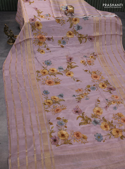 Semi georgette saree pastel pink with allover floral prints and long zari woven border