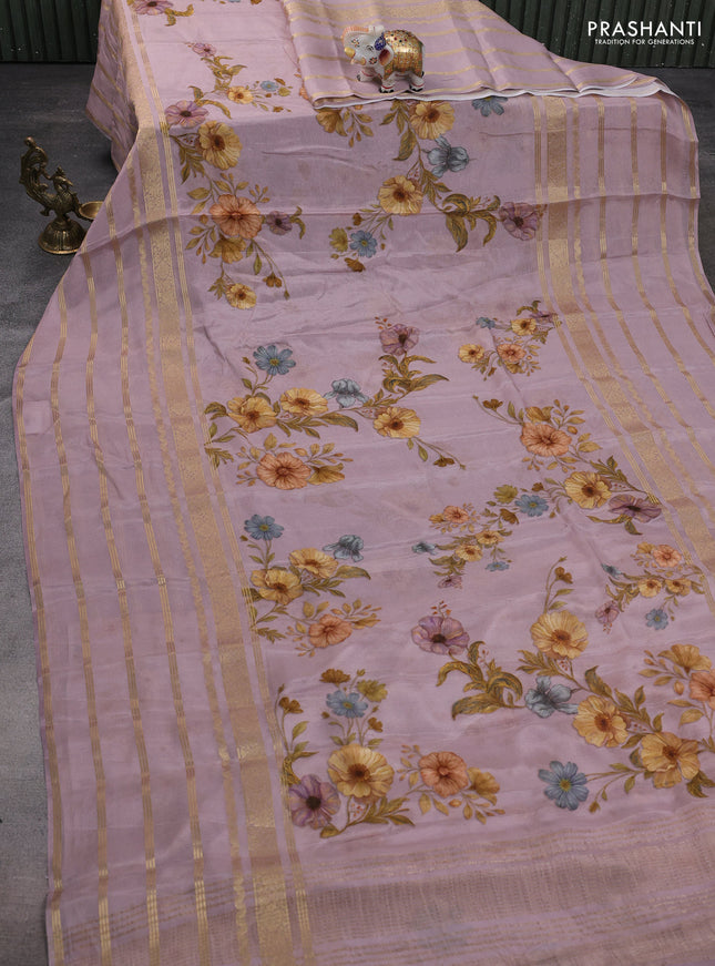 Semi georgette saree pastel pink with allover floral prints and long zari woven border