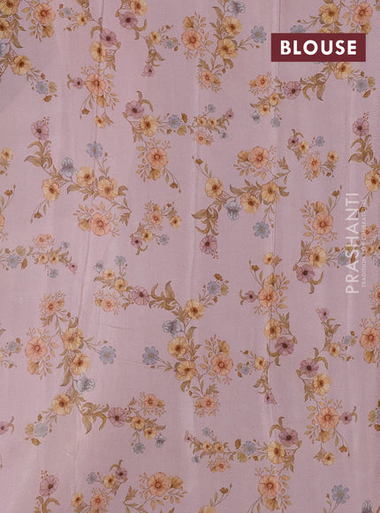 Semi georgette saree pastel pink with allover floral prints and long zari woven border