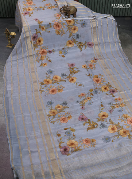 Semi georgette saree grey with allover floral prints and long zari woven border