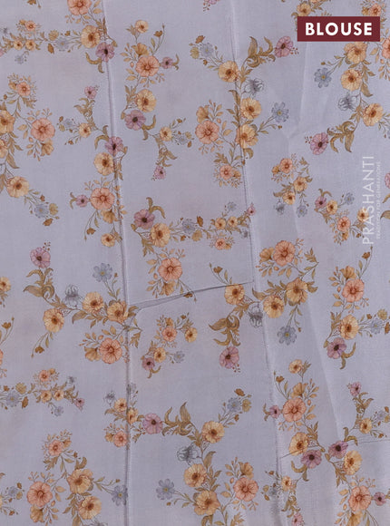 Semi georgette saree grey with allover floral prints and long zari woven border