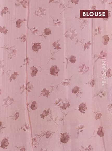 Semi georgette saree peach shade with allover floral prints and long zari woven border
