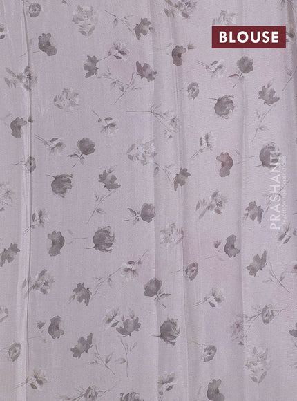 Semi georgette saree grey with allover floral prints and long zari woven border