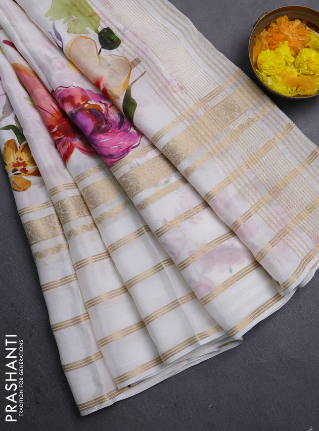 Semi georgette saree off white with allover floral prints and long zari woven border