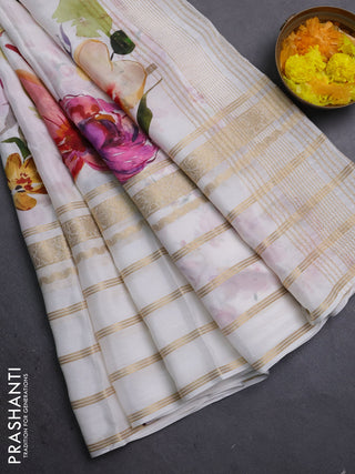 Semi georgette saree off white with allover floral prints and long zari woven border