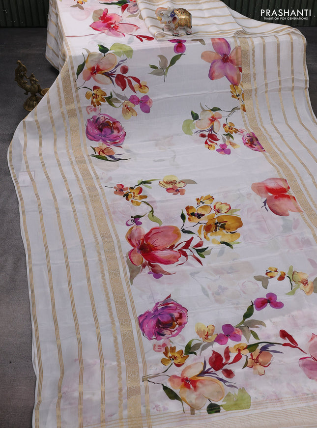 Semi georgette saree off white with allover floral prints and long zari woven border