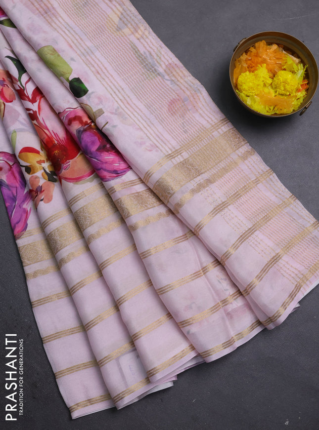 Semi georgette saree baby pink with allover floral prints and long zari woven border