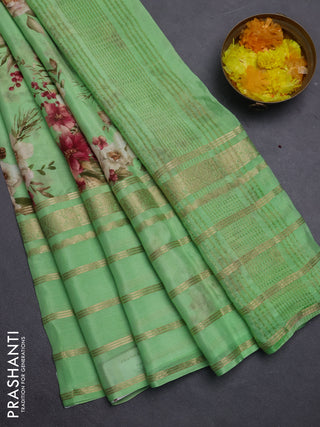 Semi georgette saree green with allover floral prints and long zari woven border