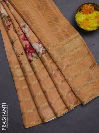 Semi georgette saree orange with allover floral prints and long zari woven border