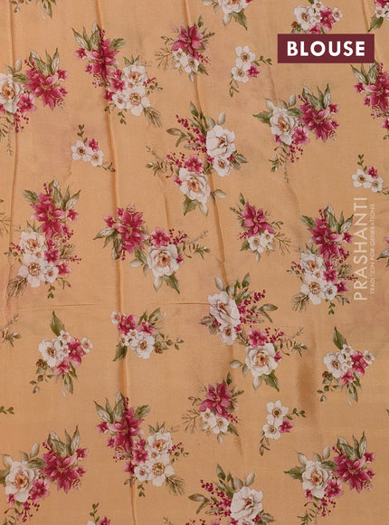 Semi georgette saree orange with allover floral prints and long zari woven border