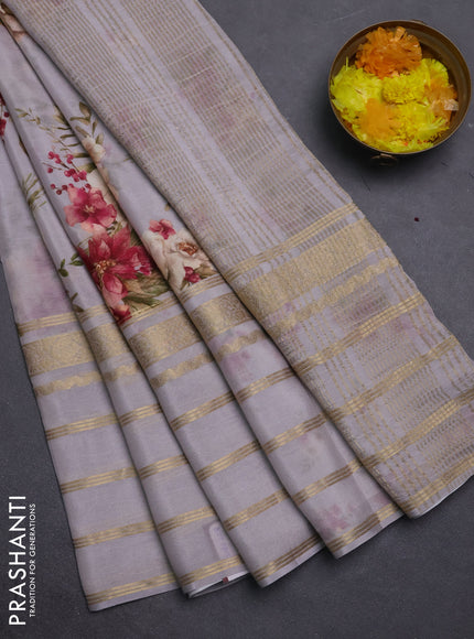 Semi georgette saree pastel grey with allover floral prints and long zari woven border