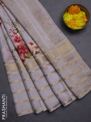 Semi georgette saree pastel grey with allover floral prints and long zari woven border