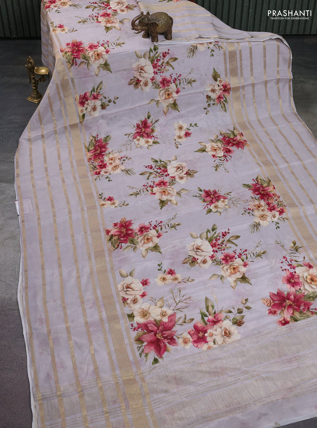 Semi georgette saree pastel grey with allover floral prints and long zari woven border
