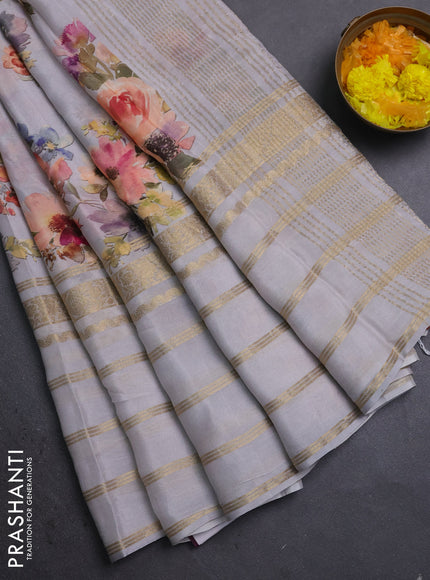 Semi georgette saree pastel grey with allover floral prints and long zari woven border