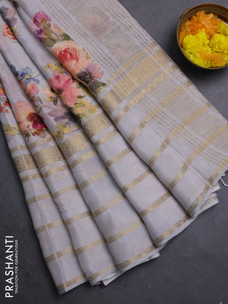 Semi georgette saree pastel grey with allover floral prints and long zari woven border