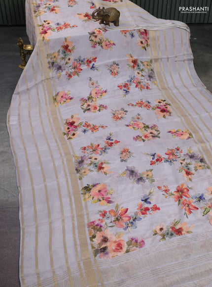 Semi georgette saree pastel grey with allover floral prints and long zari woven border