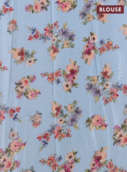 Semi georgette saree pastel blue with allover floral prints and long zari woven border
