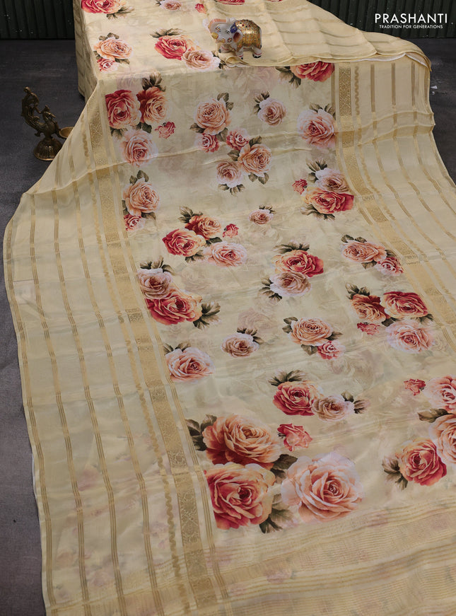 Semi georgette saree pale yellow with allover floral prints and long zari woven border