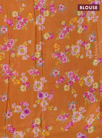 Semi georgette saree rustic orange with allover floral prints and long zari woven border