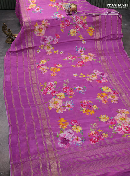 Semi georgette saree purple with allover floral prints and long zari woven border