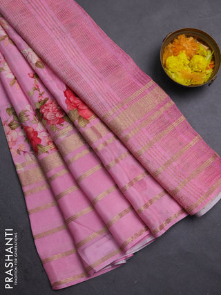 Semi georgette saree light pink with allover floral prints and long zari woven border