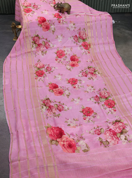 Semi georgette saree light pink with allover floral prints and long zari woven border