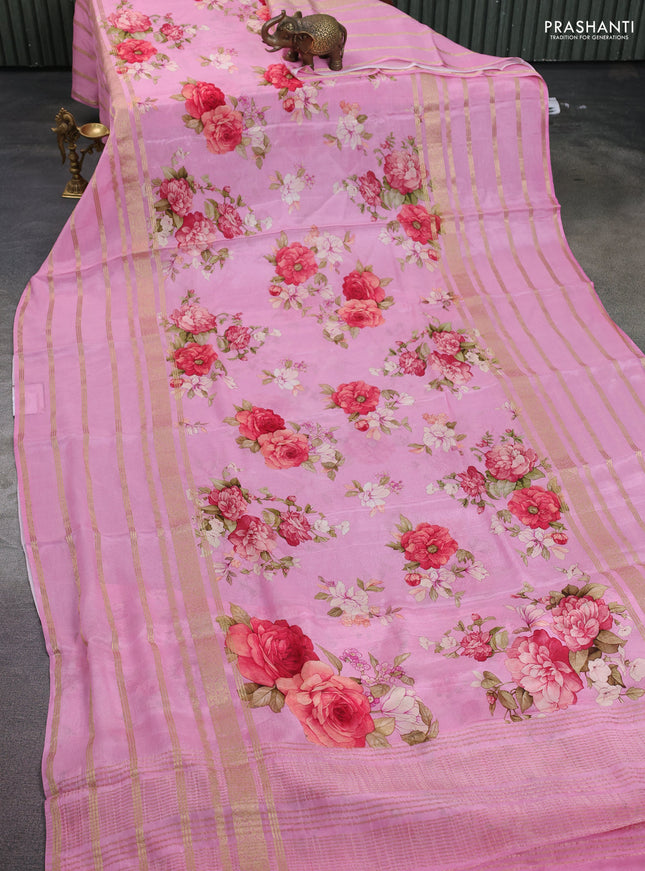 Semi georgette saree light pink with allover floral prints and long zari woven border