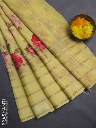 Semi georgette saree yellow with allover floral prints and long zari woven border