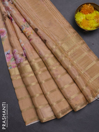 Semi georgette saree orange with allover floral prints and long zari woven border