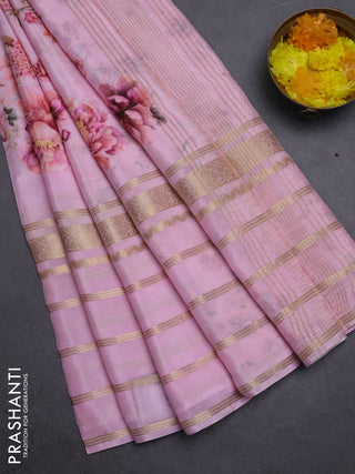 Semi georgette saree light pink with allover floral prints and long zari woven border