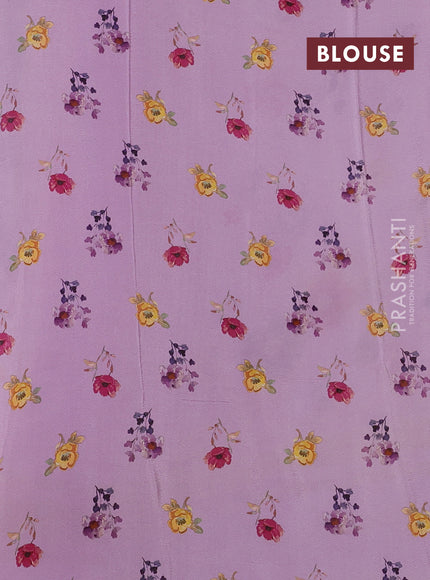 Semi georgette saree lavender with allover floral prints and long zari woven border