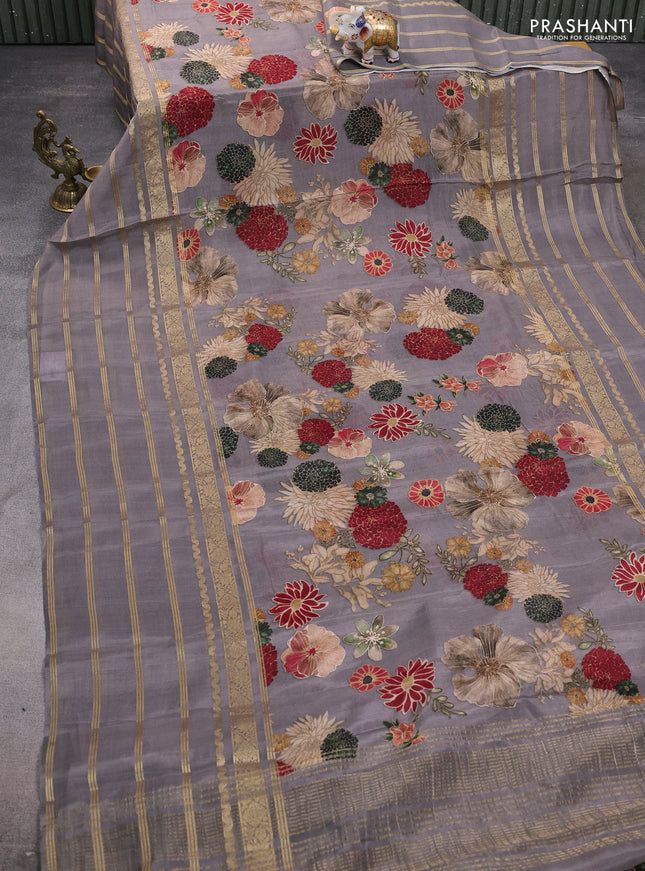 Semi georgette saree grey with allover floral prints and long zari woven border