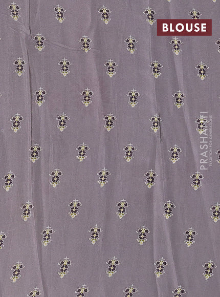 Semi georgette saree grey with allover floral prints and long zari woven border