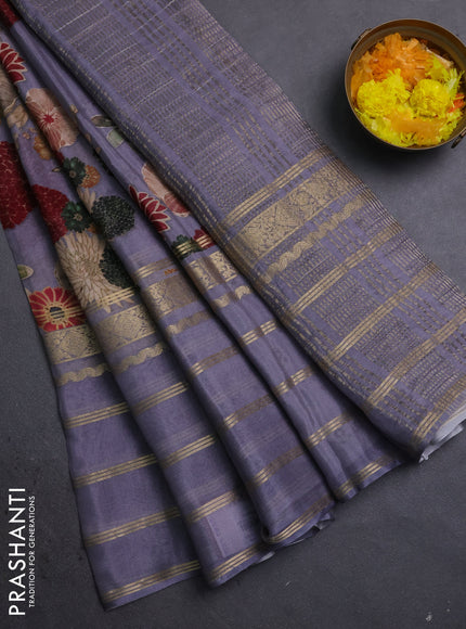Semi georgette saree grey with allover floral prints and long zari woven border