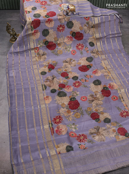 Semi georgette saree grey with allover floral prints and long zari woven border