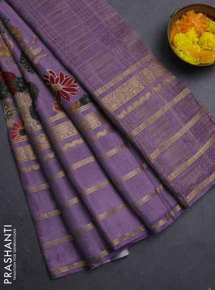 Semi georgette saree pastel purple with allover floral prints and long zari woven border