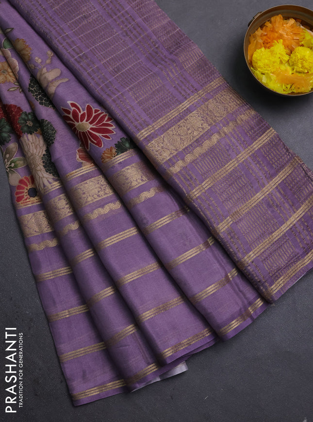 Semi georgette saree pastel purple with allover floral prints and long zari woven border