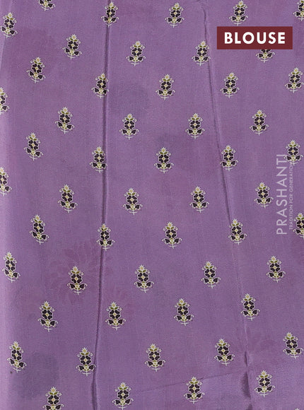 Semi georgette saree pastel purple with allover floral prints and long zari woven border