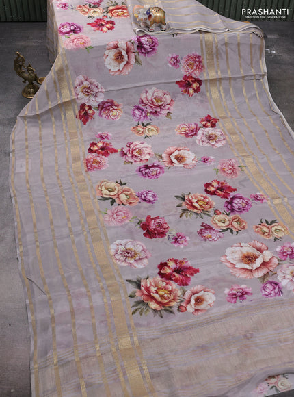 Semi georgette saree grey with allover floral prints and long zari woven border