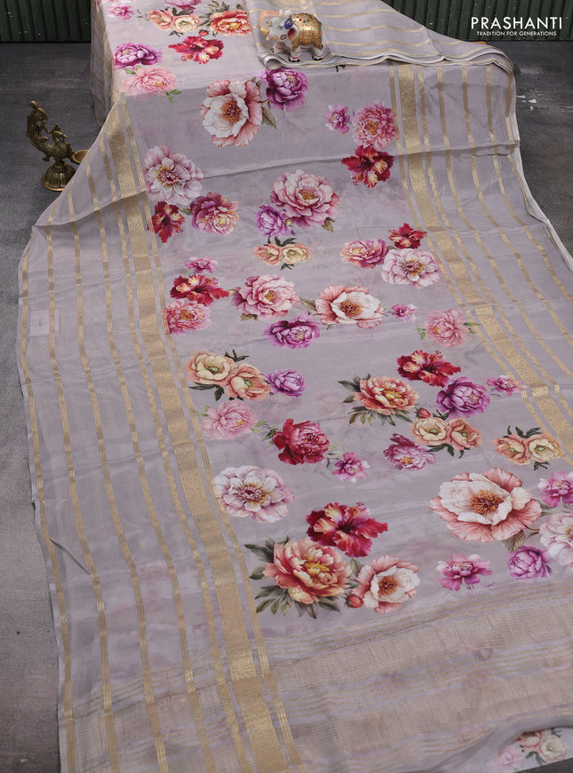 Semi georgette saree grey with allover floral prints and long zari woven border