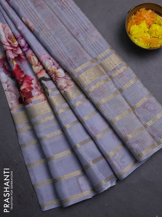 Semi georgette saree grey with allover floral prints and long zari woven border