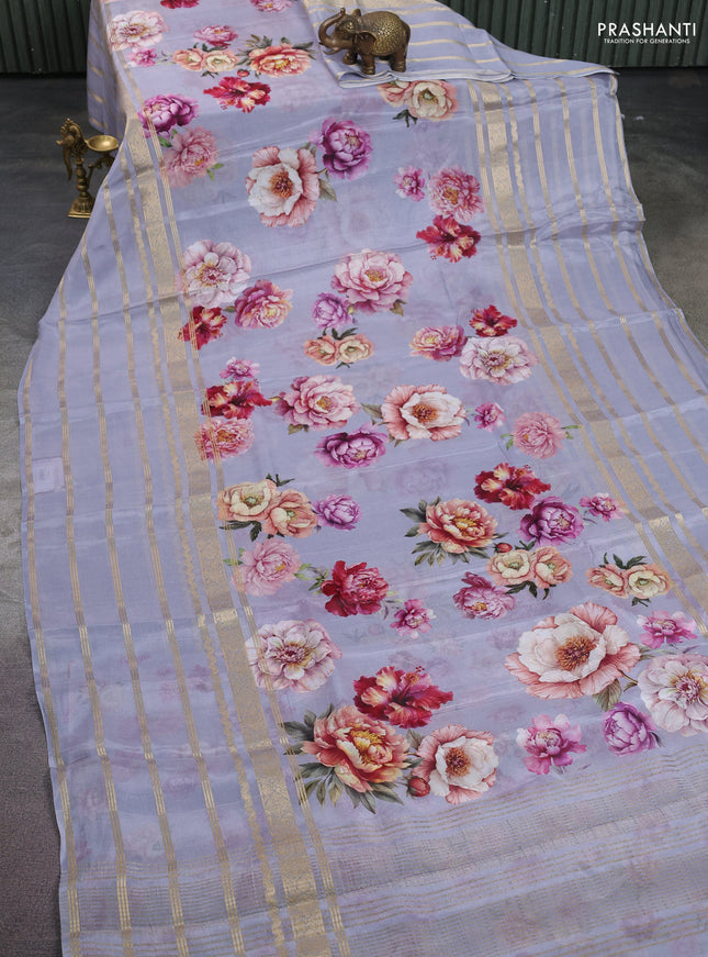 Semi georgette saree grey with allover floral prints and long zari woven border