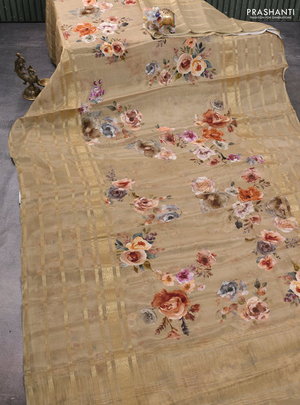 Semi georgette saree elaichi green with allover floral prints and long zari woven border