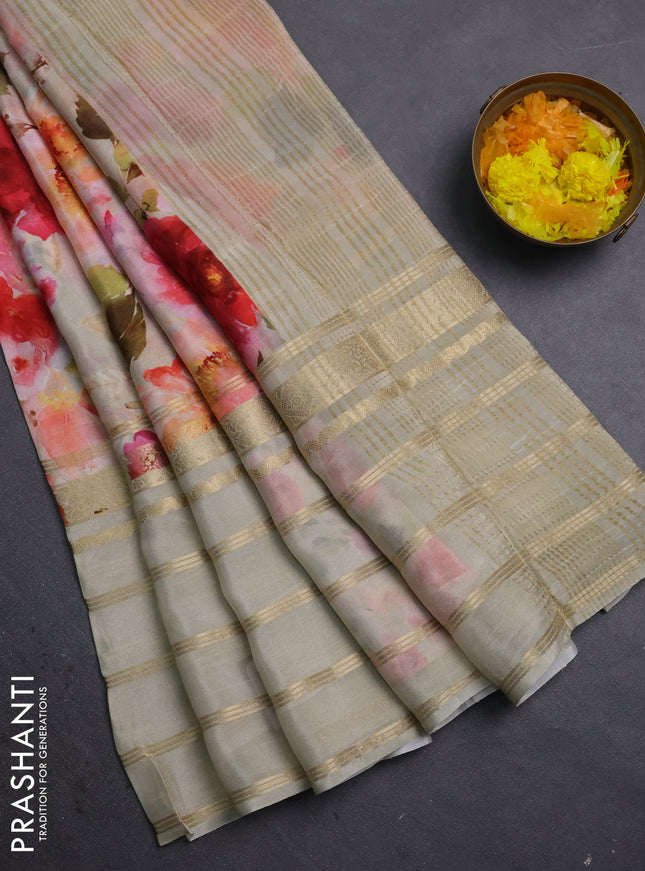Semi georgette saree beige with allover floral prints and long zari woven border