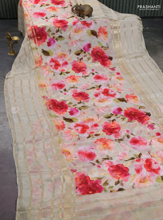 Semi georgette saree beige with allover floral prints and long zari woven border