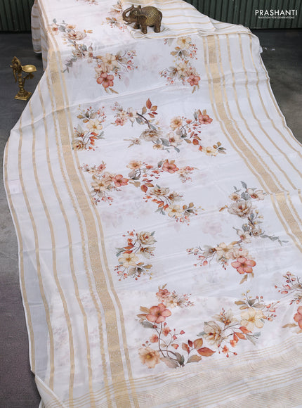 Semi georgette saree off white with allover floral prints and long zari woven border