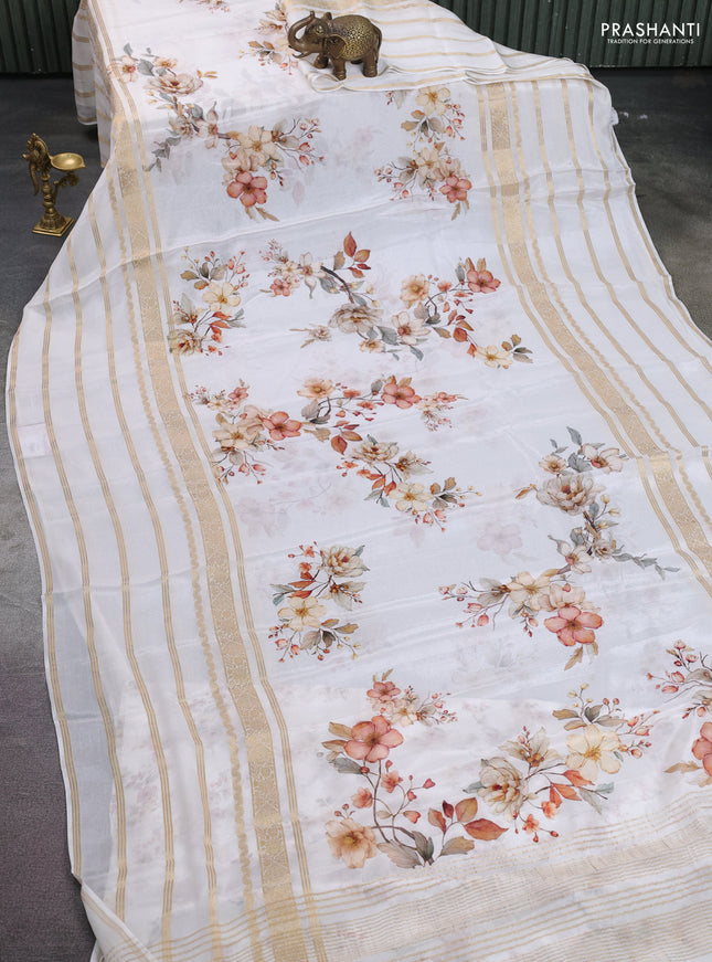 Semi georgette saree off white with allover floral prints and long zari woven border